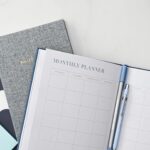 a pen and a notebook